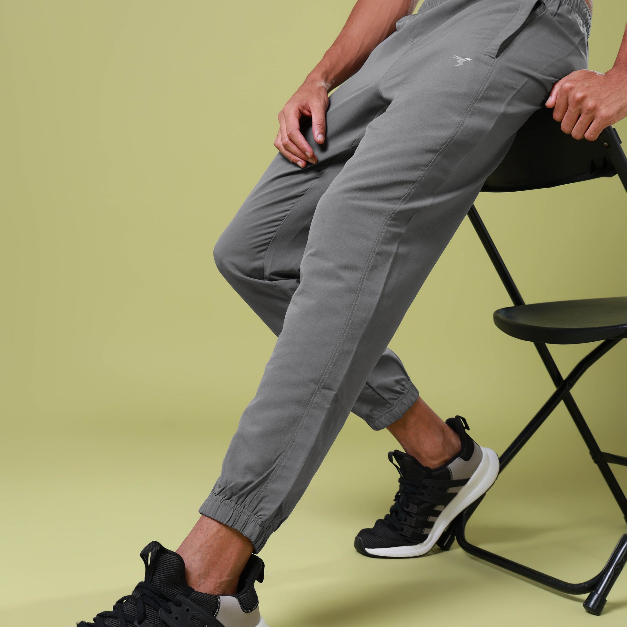 Men Solid Relax Fit Joggers with TECHNOLITE