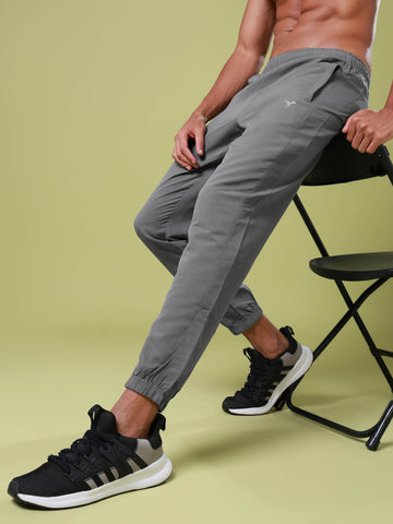 Men Solid Relax Fit Joggers with TECHNOLITE