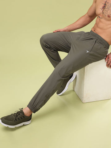 Men Solid Relax Fit Joggers with TECHNOLITE