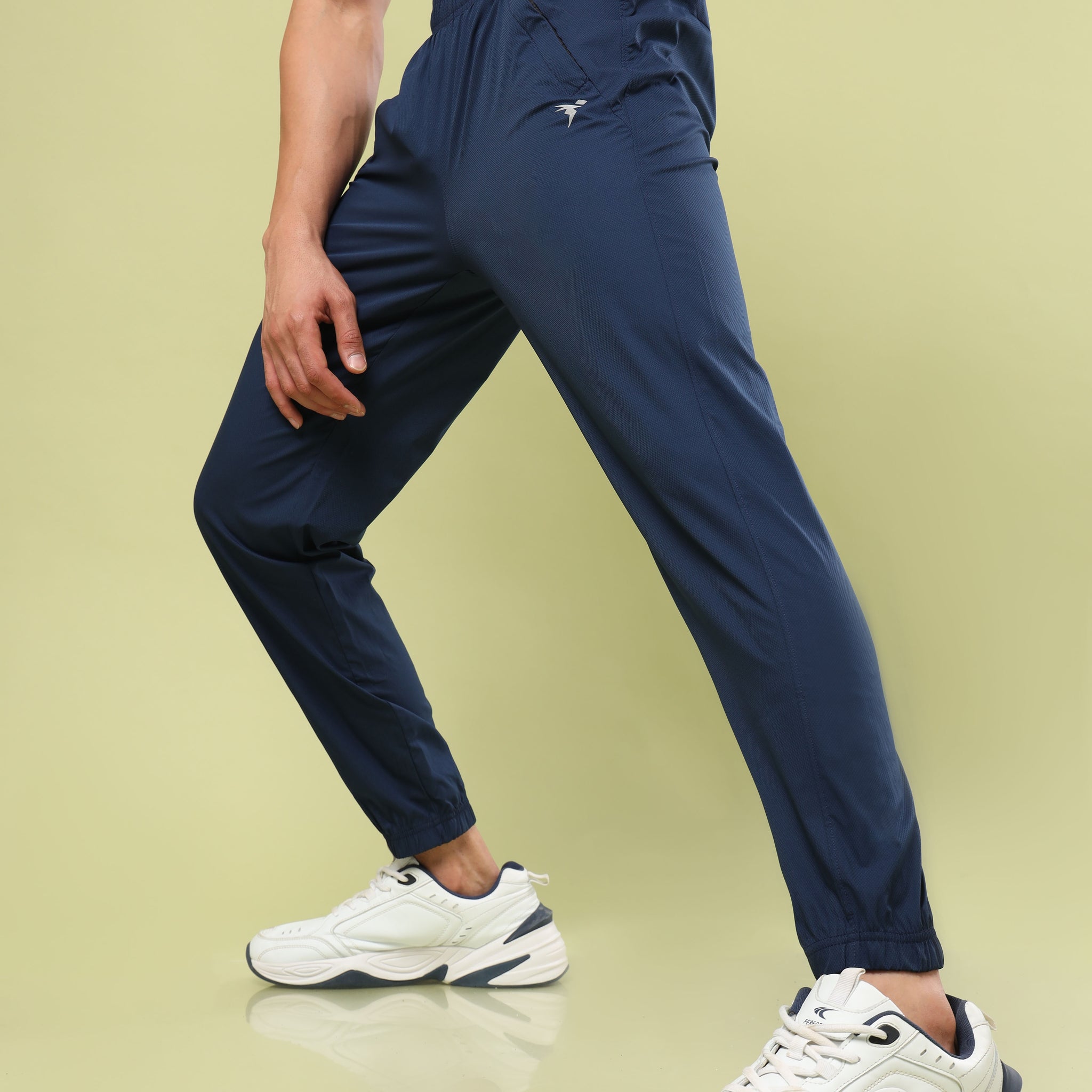 Men Solid Relax Fit Joggers with TECHNOLITE